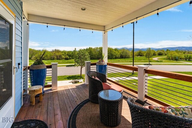 5333 Westmorland Dr, Bozeman, MT 59718 - wooden deck featuring a mountain view