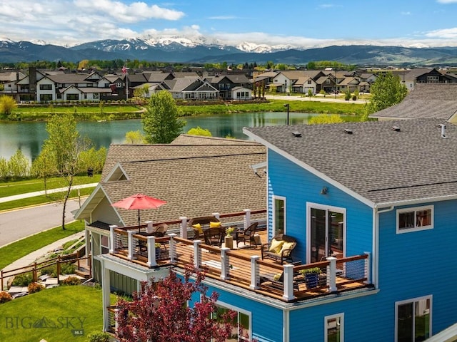 5333 Westmorland Dr, Bozeman, MT 59718 - rear view of house featuring a residential view, a water and mountain view, and roof with shingles