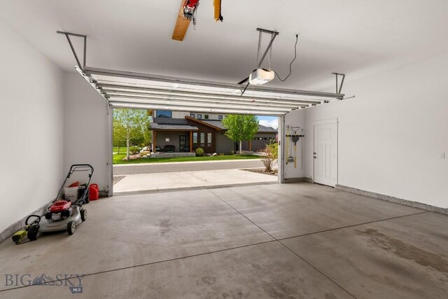 5333 Westmorland Dr, Bozeman, MT 59718 - garage featuring a garage door opener