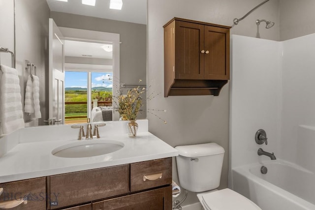 5333 Westmorland Dr, Bozeman, MT 59718 - bathroom featuring bathtub / shower combination, vanity, toilet, and ensuite bathroom