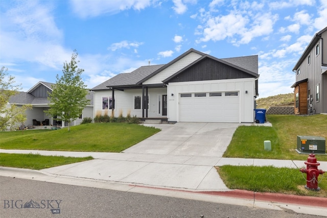 1215 Sweetgrass Ln, Livingston, MT 59047 - view of front facade featuring a garage, board and batten siding, a front yard, and driveway