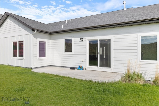 1215 Sweetgrass Ln, Livingston, MT 59047 - back of house with a patio, a lawn, and roof with shingles
