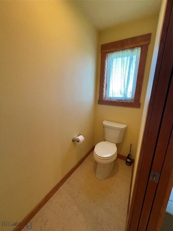 30 Harris Hawk Ct, Dillon, MT 59725 - bathroom with toilet and baseboards
