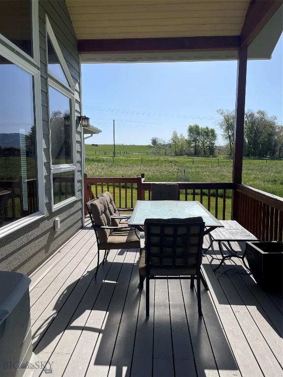 30 Harris Hawk Ct, Dillon, MT 59725 - wooden terrace featuring a view of rural / pastoral area and outdoor dining area