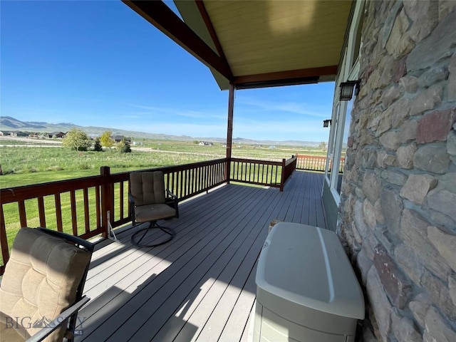 30 Harris Hawk Ct, Dillon, MT 59725 - wooden deck featuring a mountain view and a view of rural / pastoral area