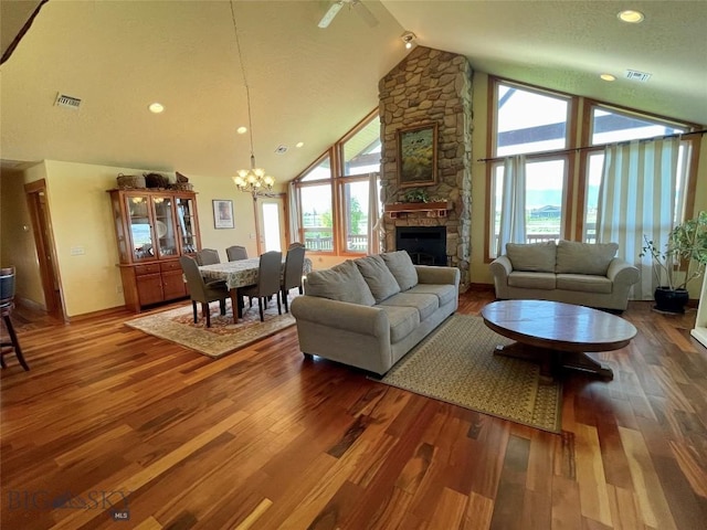 30 Harris Hawk Ct, Dillon, MT 59725 - living room with a chandelier, a fireplace, wood finished floors, high vaulted ceiling, and recessed lighting