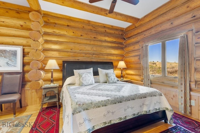 23 Lake Trl, Cameron, MT 59720 - bedroom with wood finished floors and rustic walls