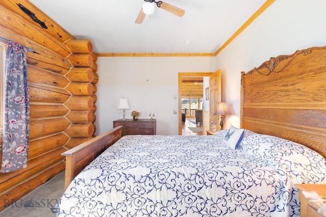 23 Lake Trl, Cameron, MT 59720 - bedroom with rustic walls, carpet floors, crown molding, and ceiling fan