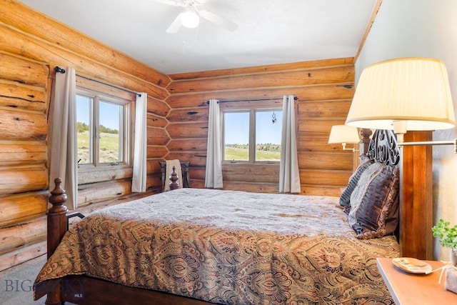 23 Lake Trl, Cameron, MT 59720 - bedroom with log walls and a ceiling fan