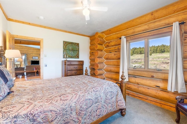 23 Lake Trl, Cameron, MT 59720 - bedroom with log walls, a ceiling fan, and carpet