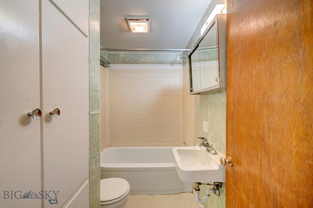 109 N Broadway, Manhattan, MT 59741 - full bath featuring toilet, tile patterned flooring, washtub / shower combination, and a sink