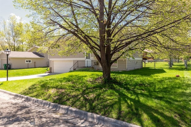 416 Morrow St, Bozeman, MT 59715 - view of front of house with asphalt driveway and a garage