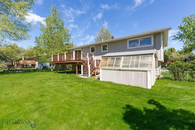 416 Morrow St, Bozeman, MT 59715 - rear view of house with a wooden deck and stairway