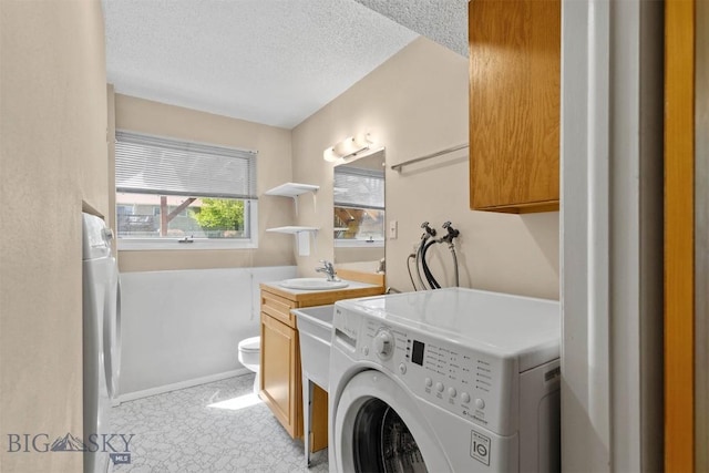 416 Morrow St, Bozeman, MT 59715 - laundry room with hookup for a washing machine, a textured ceiling, and a sink