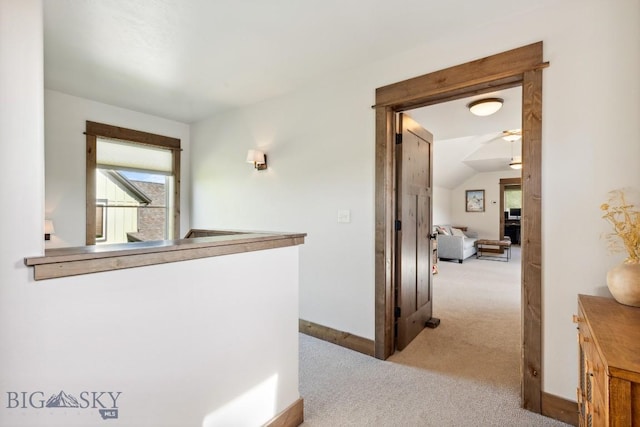 2296 Boylan Rd, Bozeman, MT 59715 - corridor with carpet, baseboards, and vaulted ceiling
