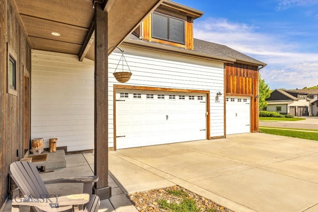 2296 Boylan Rd, Bozeman, MT 59715 - garage featuring concrete driveway