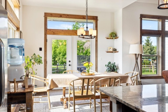 2296 Boylan Rd, Bozeman, MT 59715 - dining area featuring healthy amount of natural light and a chandelier