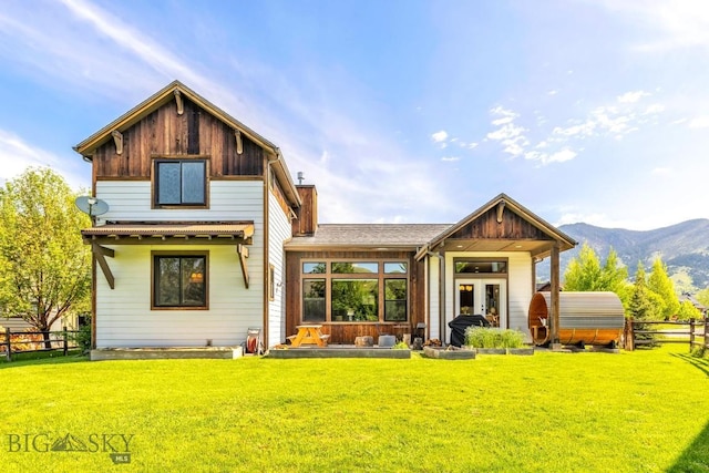 2296 Boylan Rd, Bozeman, MT 59715 - rear view of property with a mountain view and board and batten siding