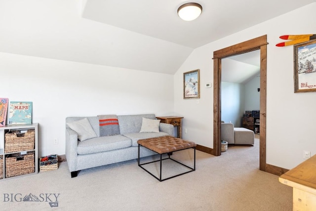 2296 Boylan Rd, Bozeman, MT 59715 - living room featuring light carpet, vaulted ceiling, and baseboards