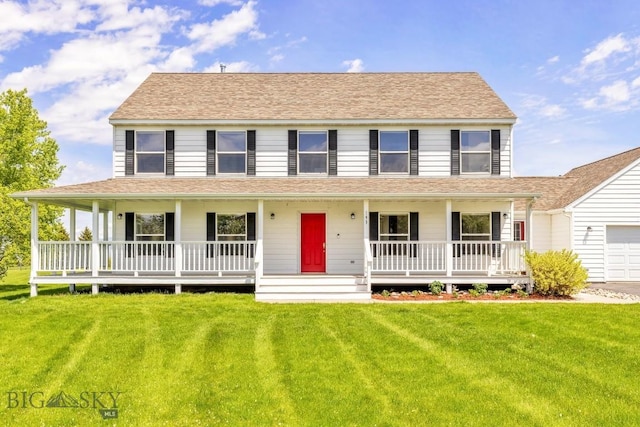 193 Lucille Ln, Bozeman, MT 59718 - view of front of home with a porch, a front yard, and a garage