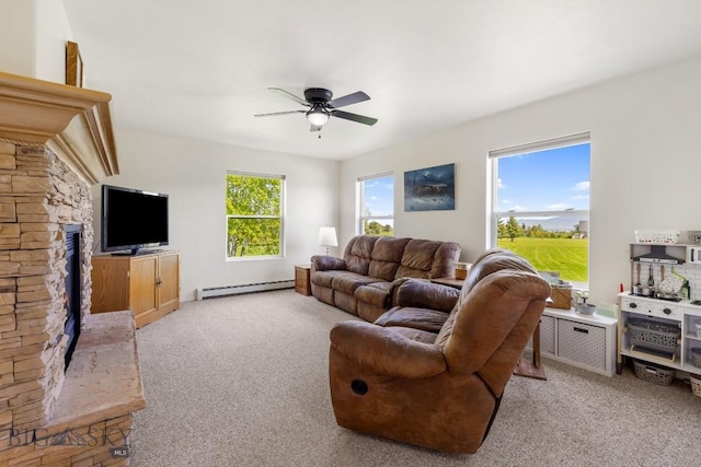 193 Lucille Ln, Bozeman, MT 59718 - living area with baseboard heating, light colored carpet, and a ceiling fan