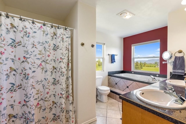 193 Lucille Ln, Bozeman, MT 59718 - bathroom featuring tile patterned flooring, toilet, double vanity, tiled bath, and a shower with curtain