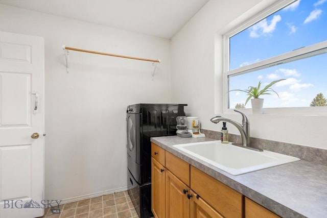 193 Lucille Ln, Bozeman, MT 59718 - laundry area featuring a sink and baseboards