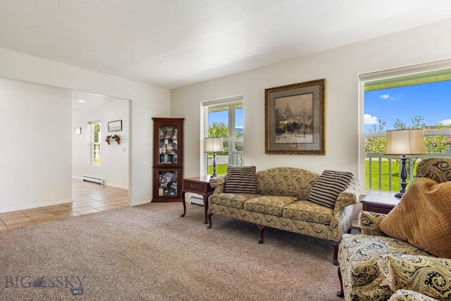 193 Lucille Ln, Bozeman, MT 59718 - living room with a baseboard radiator, tile patterned flooring, carpet floors, and baseboards