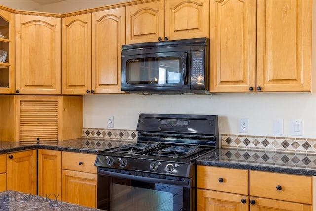 193 Lucille Ln, Bozeman, MT 59718 - kitchen featuring black appliances, dark stone countertops, and tasteful backsplash