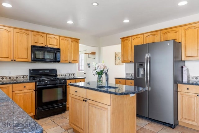 193 Lucille Ln, Bozeman, MT 59718 - kitchen featuring black appliances, a sink, dark stone counters, recessed lighting, and light tile patterned flooring