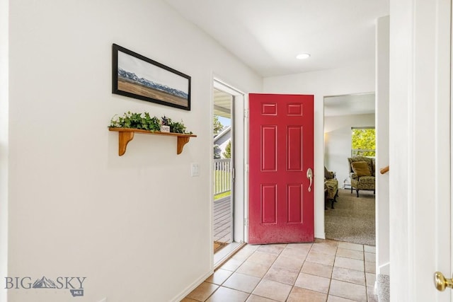 193 Lucille Ln, Bozeman, MT 59718 - entryway featuring light tile patterned floors, recessed lighting, and light colored carpet