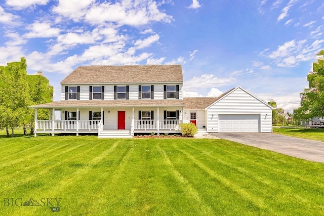 193 Lucille Ln, Bozeman, MT 59718 - view of front of house with a porch, driveway, an attached garage, and a front yard