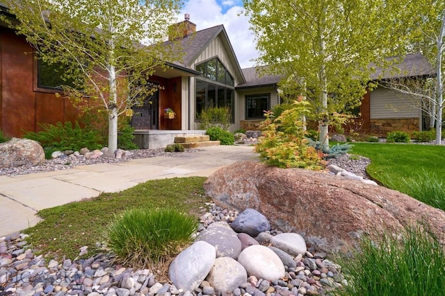 65 Triple Tree Ln, Bozeman, MT 59715 - view of front of house featuring a chimney
