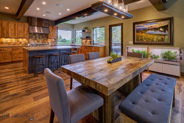 65 Triple Tree Ln, Bozeman, MT 59715 - dining space with beamed ceiling, dark wood-type flooring, and recessed lighting