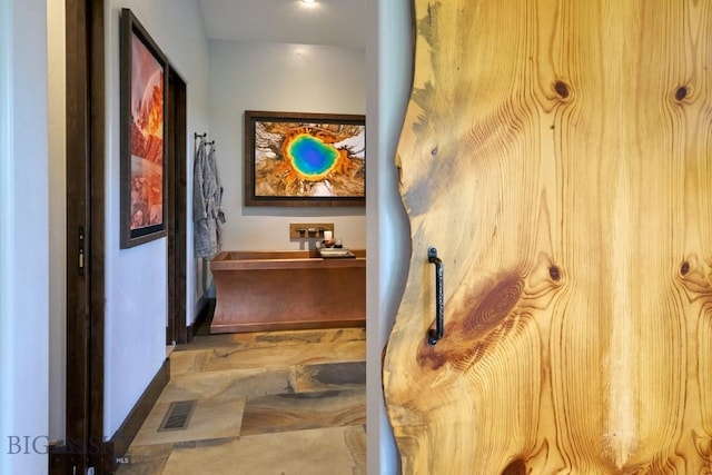 65 Triple Tree Ln, Bozeman, MT 59715 - corridor featuring baseboards