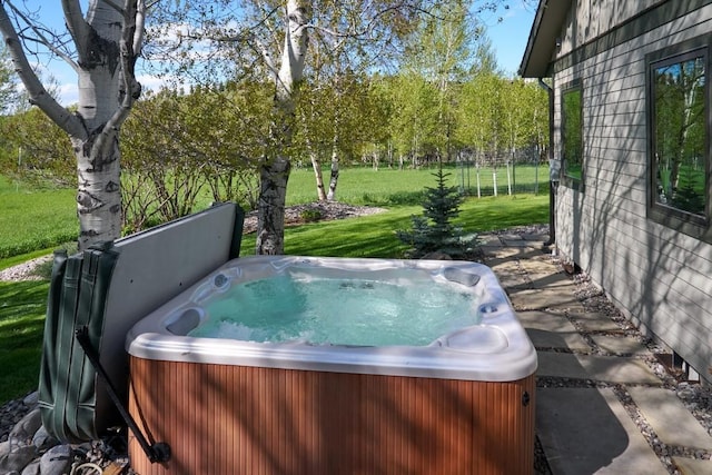 65 Triple Tree Ln, Bozeman, MT 59715 - view of patio / terrace featuring a hot tub