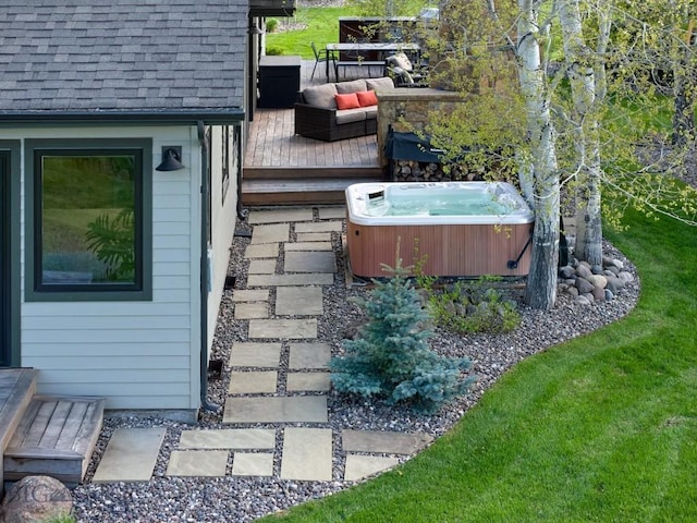 65 Triple Tree Ln, Bozeman, MT 59715 - view of side of home featuring a hot tub, a wooden deck, and roof with shingles