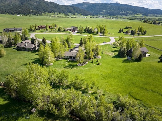 65 Triple Tree Ln, Bozeman, MT 59715 - aerial view of sparsely populated area featuring a mountain backdrop and a pastoral area