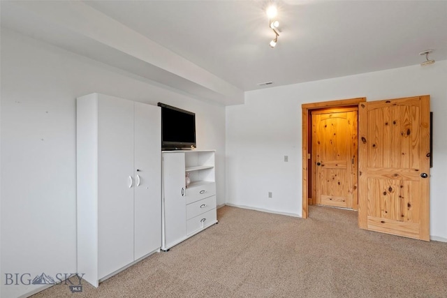 1511 Mt Highway 287, Virginia City, MT 59755 - unfurnished bedroom featuring light carpet and baseboards