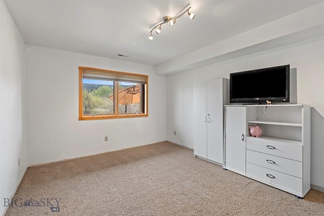 1511 Mt Highway 287, Virginia City, MT 59755 - unfurnished bedroom with light colored carpet