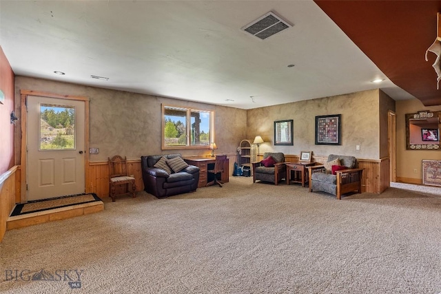 1511 Mt Highway 287, Virginia City, MT 59755 - carpeted living room with a wainscoted wall, wooden walls, and recessed lighting