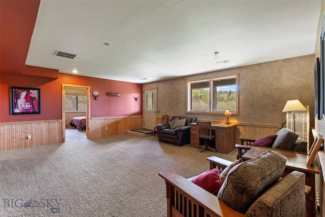 1511 Mt Highway 287, Virginia City, MT 59755 - living area with a wainscoted wall, healthy amount of natural light, carpet flooring, and wood walls
