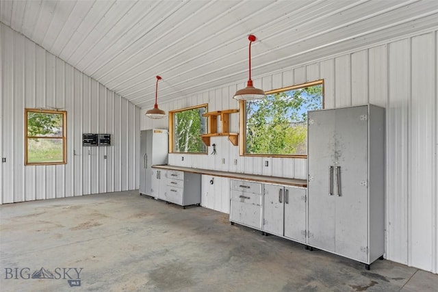 1511 Mt Highway 287, Virginia City, MT 59755 - kitchen featuring concrete floors, hanging light fixtures, and open shelves