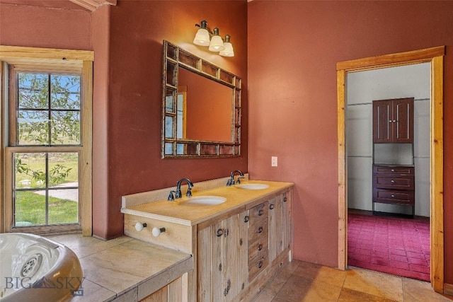 1511 Mt Highway 287, Virginia City, MT 59755 - full bathroom with plenty of natural light, double vanity, a bath, and tile patterned floors