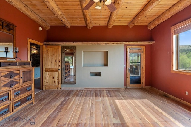 1511 Mt Highway 287, Virginia City, MT 59755 - unfurnished living room with wooden ceiling with exposed beams, a ceiling fan, and hardwood / wood-style flooring