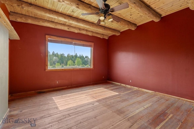 1511 Mt Highway 287, Virginia City, MT 59755 - empty room with wooden ceiling with exposed beams, light wood finished floors, ceiling fan, and baseboards
