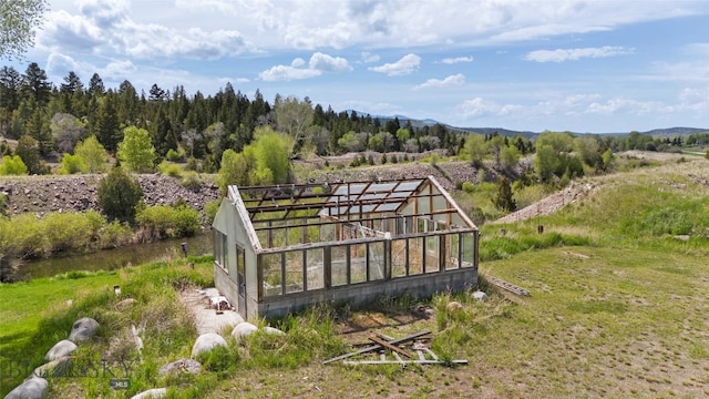 1511 Mt Highway 287, Virginia City, MT 59755 - view of community with a greenhouse and an outbuilding