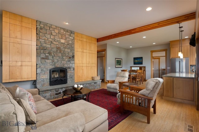 101 Columbine Ct, Bozeman, MT 59715 - living area featuring light wood-style floors, recessed lighting, and a fireplace