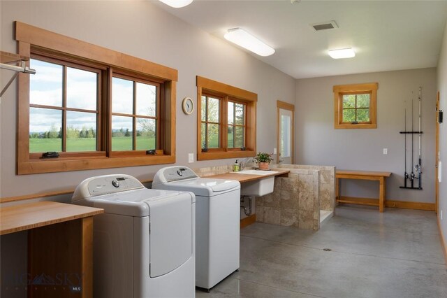101 Columbine Ct, Bozeman, MT 59715 - laundry room featuring washing machine and dryer and baseboards