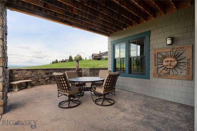 101 Columbine Ct, Bozeman, MT 59715 - view of patio featuring outdoor dining area